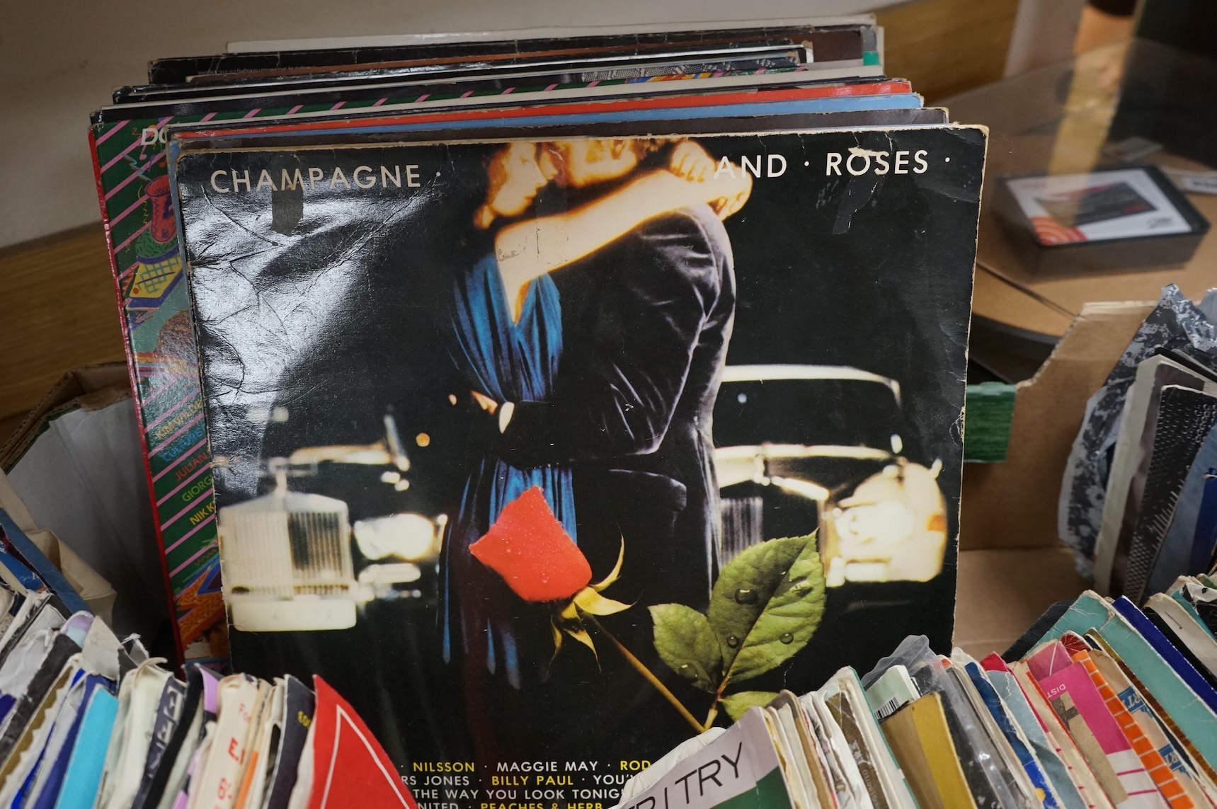 A collection of LP record albums, 12” singles and 7” singles, artists include; Dire Straits, Queen, ELO, Michael Jackson, etc.